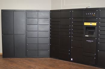 Secure mail lockers for package acceptance and delivery.